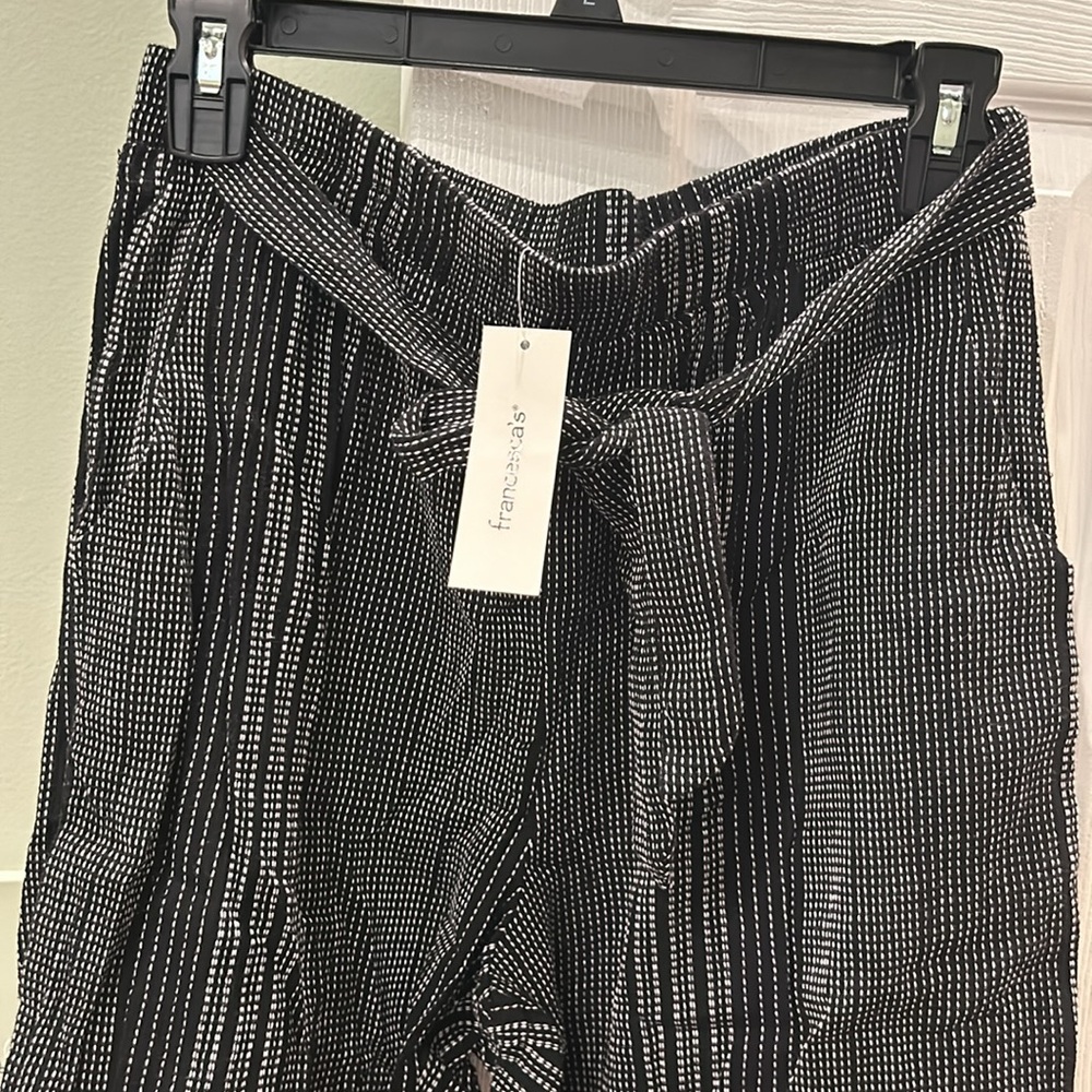 Francesca’s black and white trousers